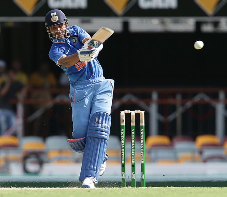 Ajinkya Rahane plays a shot during the 2nd One Day International cricket match between Australia and India in Brisbane, Australia.