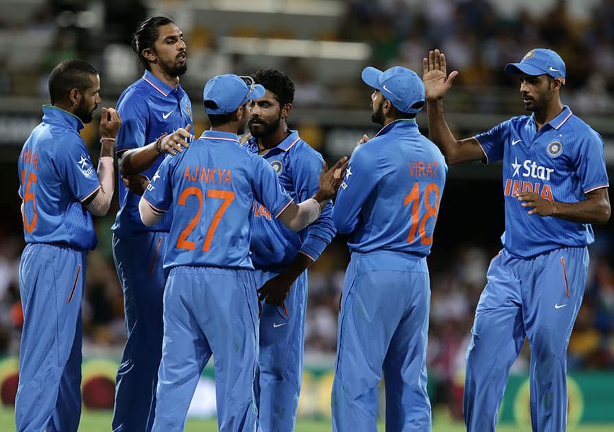 Indian players celebrates the wicket of Australia's Aaron Finch during the 2nd One Day International cricket match between Australia and India in Brisbane, Australia.