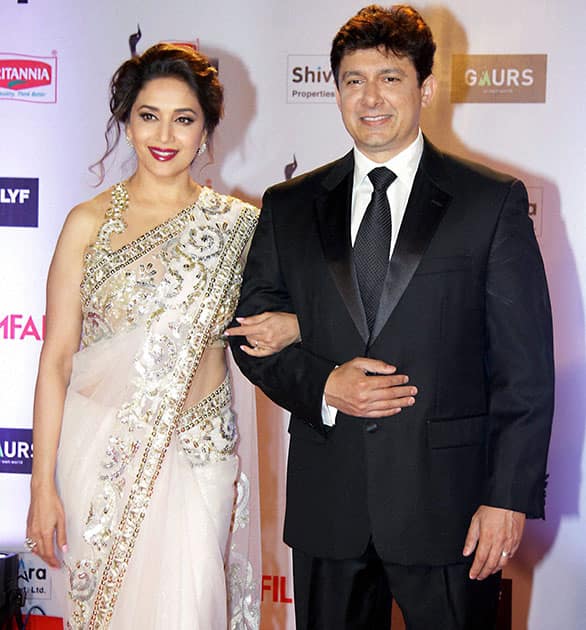 Bollywood actor Madhuri Dixit Nene with her husband Sriram Nene during the 61st Britannia Filmfare Awards function