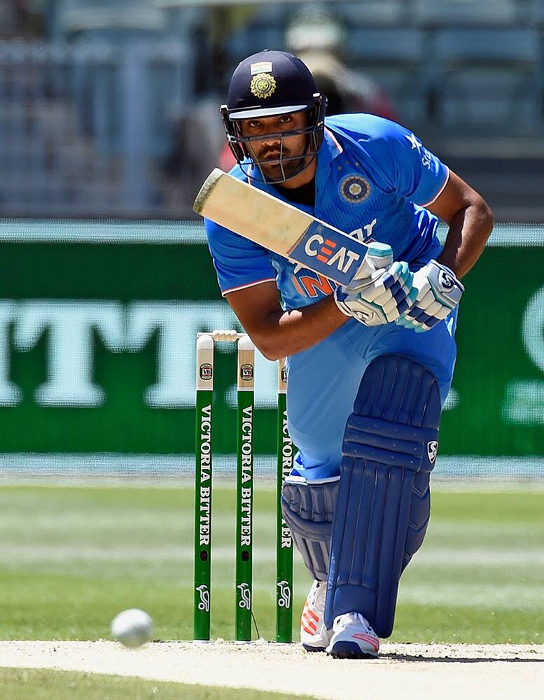 India's Rohit Sharma bats against Australia during their one day international cricket match in Melbourne, Australia.