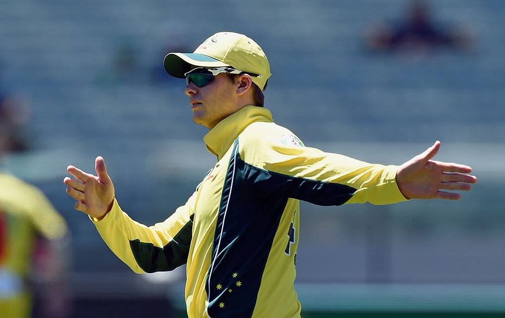 Australian captain Steven Smith places his field against India during their one day international cricket match in Melbourne, Australia.