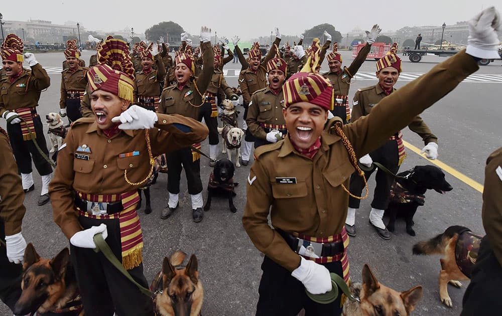 Indian Armys Remount and Veterinary Corps (RVC) dogs trained for bomb disposal and counter-insurgency take part during a rehearsal for the Republic Day parade at Vijay Chowk in New Delhi.