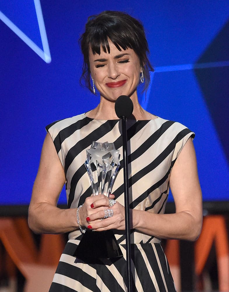 Constance Zimmer accepts the award for best supporting actress in a drama series for “UnREAL” at the 21st annual Critics' Choice Awards at the Barker Hangar in Santa Monica, Calif. 