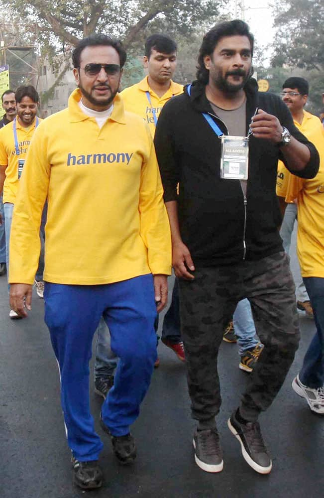 Bollywood actors Gulshan Grover and R Madhavan during Standard Chartered marathon in Mumbai.