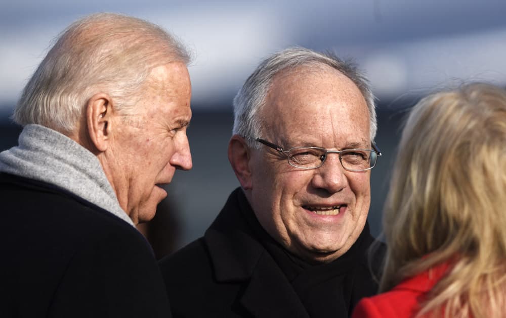 Swiss Federal President Johann Schneider-Amman, center, welcomes US Vice-President Joe Biden, left, and his wife Jill Biden at the airport in Zurich-Kloten, Switzerland.