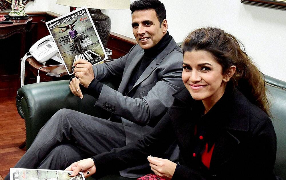 Actors Akshay Kumar and Nimrat Kaur at Air India headquarters in New Delhi to promote their upcoming film Airlift.