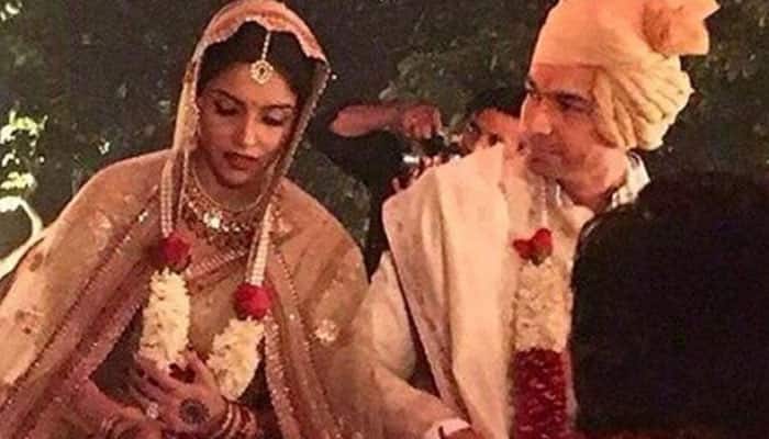 Asin-Rahul Sharma wedding: Best Man Akshay Kumar strikes a pose with bride, groom