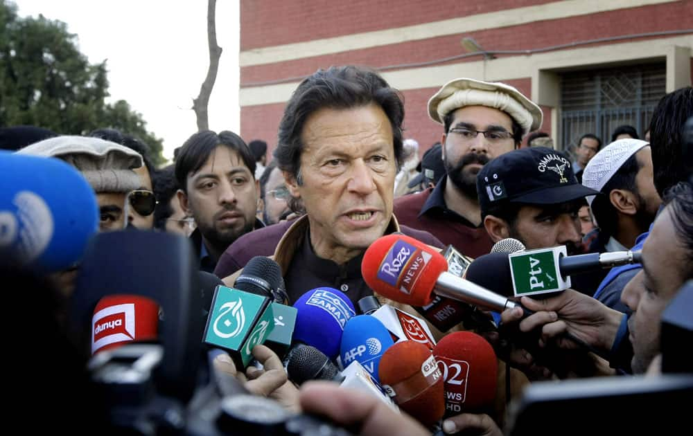 Pakistani cricketer-turned-politician talks to reporters at the Bacha Khan University in Charsadda town near Peshawar.