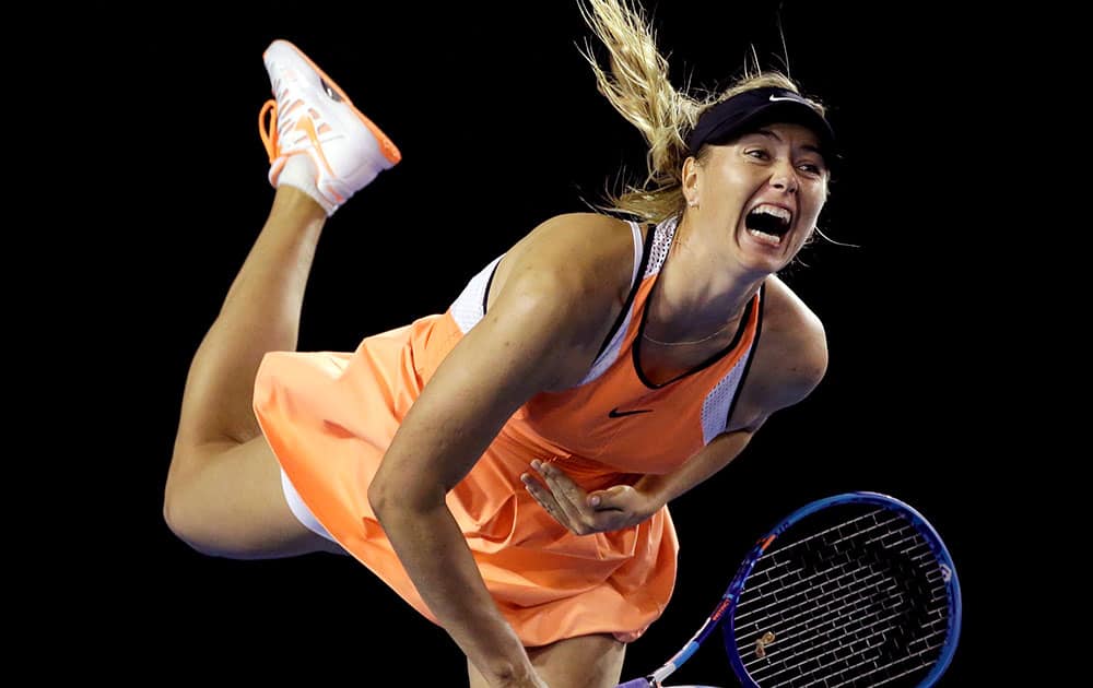 Maria Sharapova of Russia serves to Lauren Davis of the United States during their third round match at the Australian Open tennis championships in Melbourne, Australia.