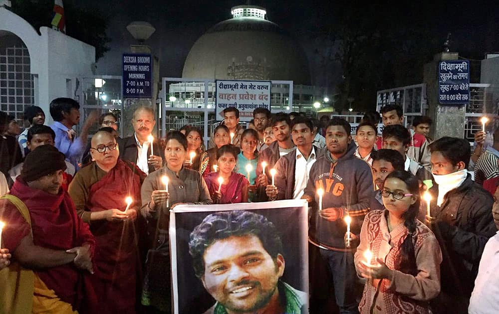 Buddhist monks and students during a candle light march seeking justice for Rohit Vemula, who committed suicide at Hyderabad Central University, at Dikshabhoomi in Nagpur.