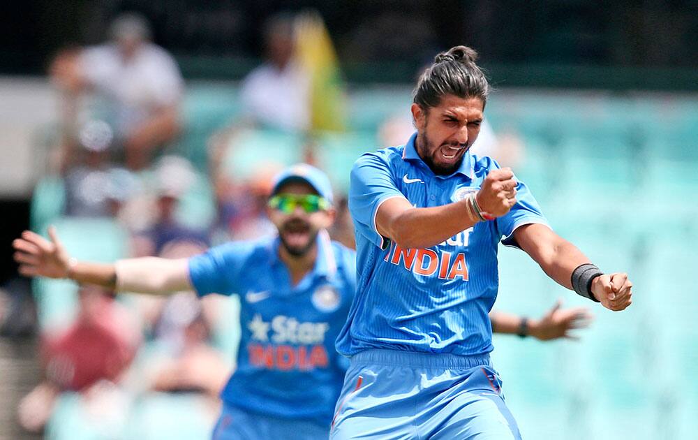 Ishant Sharma celebrates after taking the wicket of Australia's Aaron Finch during their One Day International cricket match in Sydney.