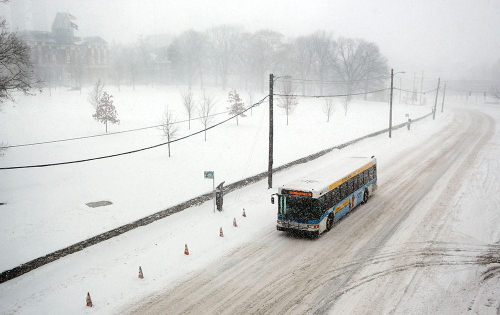 A lone city bus navigates South Limestone St. near the University of Kentucky.
