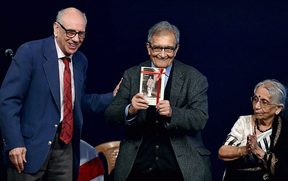 Nobel Laureate Amartya Sen releases a book on Subhash Chandra Bose as Leonard A Gordon (L), Professor of City University, New York and Krishna Bose, the niece of Netaji look on during a programme at Netaji Bhawan in Kolkata on Saturday to observe 119th birth anniversary of the great freedom-fighter.