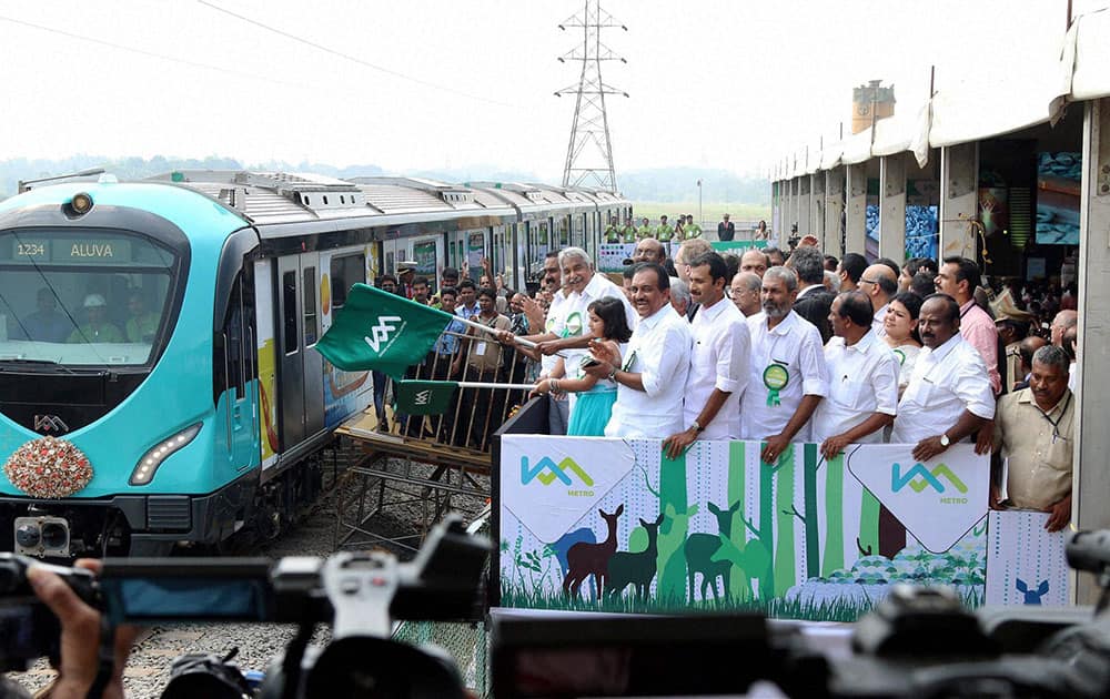 Kerala Chief Minister Oommen Chandy flags of the first test run of Kochi Metro Rail project in Kochi.