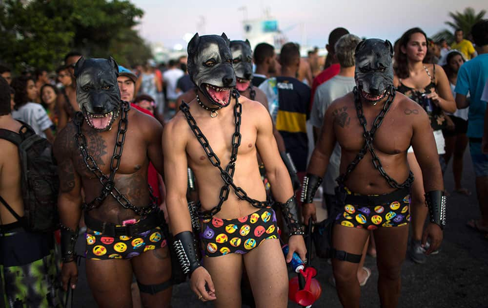 Revelers parade at the Banda de Ipanema carnival block party in Rio de Janeiro, Brazil.