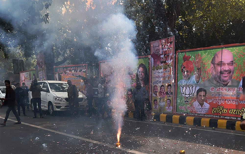 Celebrations out side of the BJP headquarters after Amit Shah re-elected the BJP President, in New Delhi.