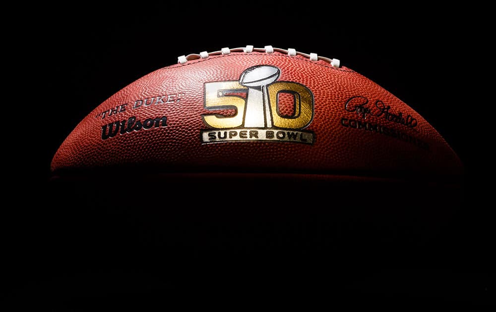 An official game ball for the NFL Super Bowl 50 football game is photographed.