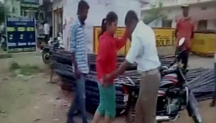 Video: Traffic policeman roughed up by two students in Telangana