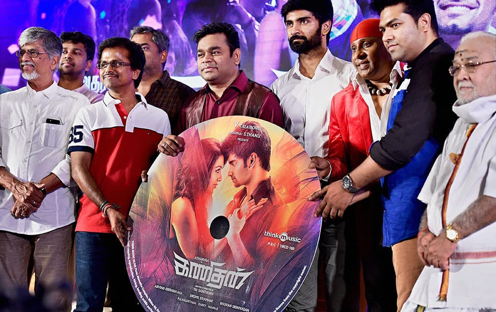 Music composer A. R. Rahman with actors Atharvaa, A.R. Murugadoss, Sivamani and others during the audio launch of their upcoming movie Kanithan in Chennai.