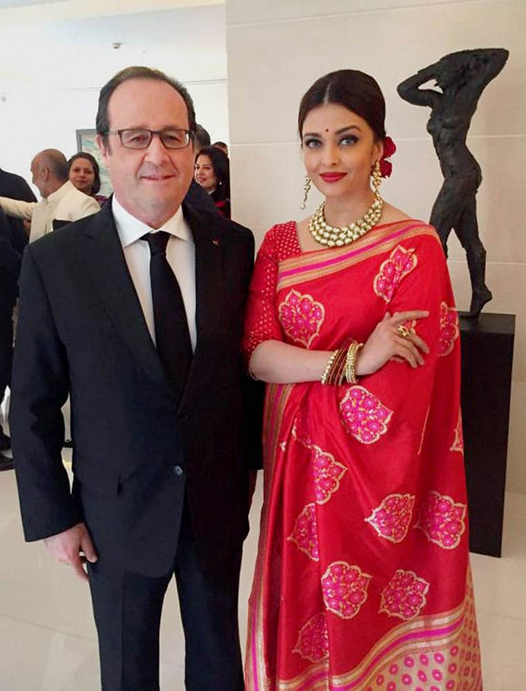 French President Francois Hollande with actress Aishwarya Rai Bachchan at a special luncheon in New Delhi.