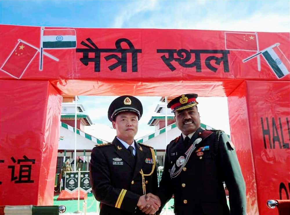 Border troops of India and China celebrate the 67th Indian Republic Day at Bum La in Arunachal Pradesh.