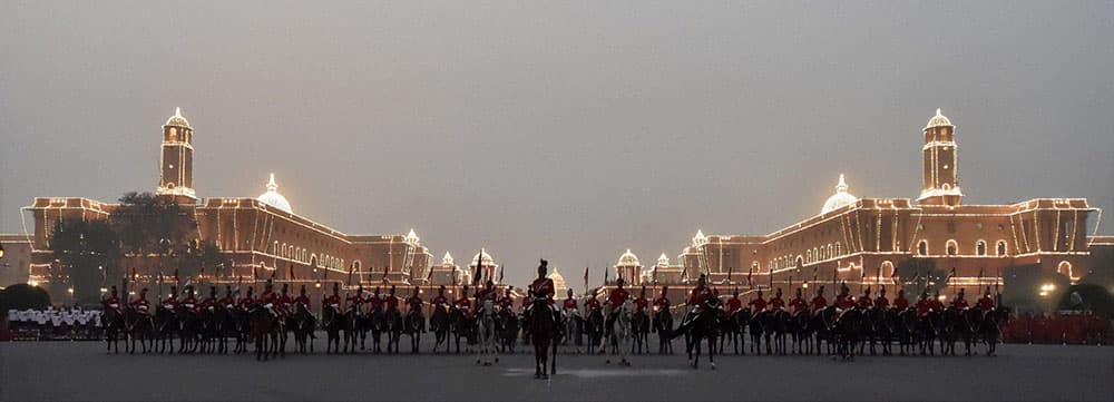 Presidents body gaurds standing for the national anthem during the full dress rehearsal for the Beating Retreat ceremony, in New Delhi.