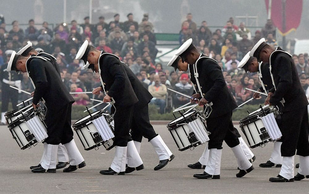 Drummers of the Navy band perform during the full dress rehearsal for the Beating Retreat ceremony, in New Delhi.