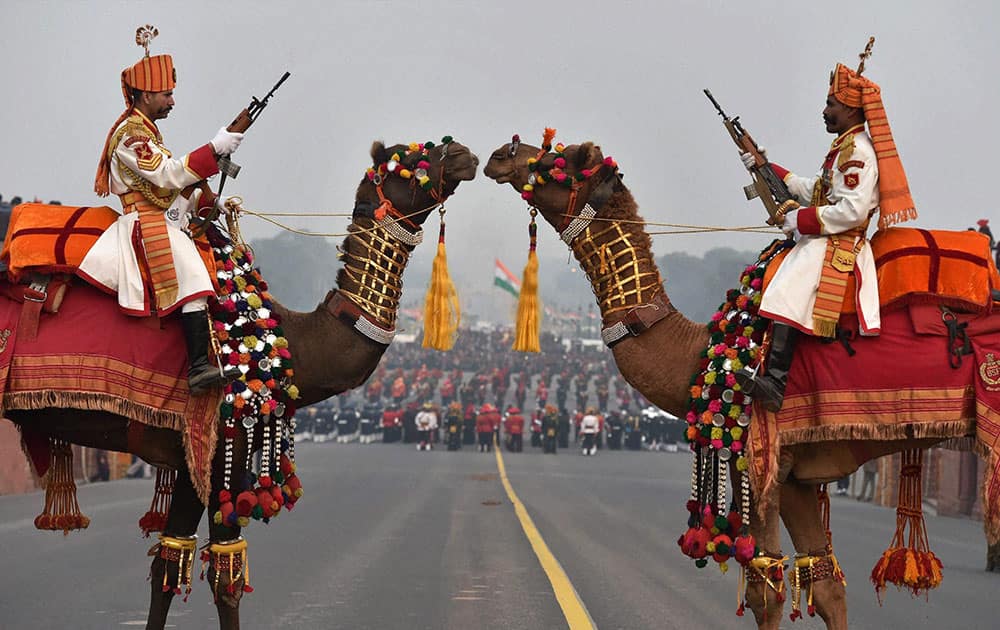 BSF soldiers mounted on camels participate in rehearsal for the Beating Retreat ceremony in New Delhi.