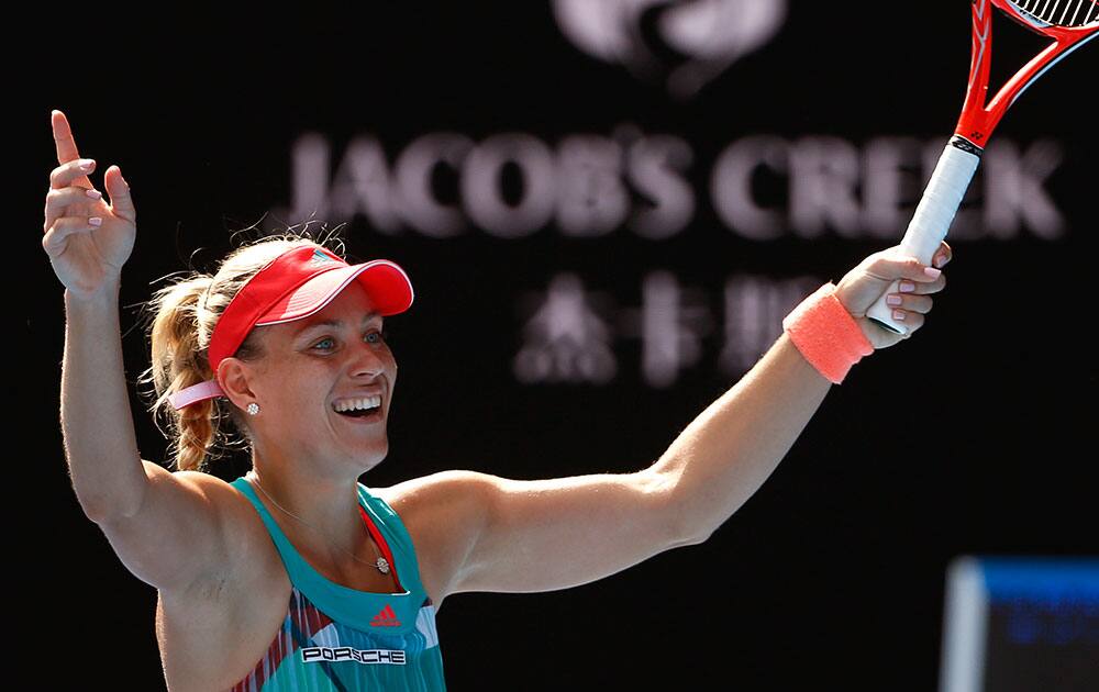 Angelique Kerber of Germany celebrates after defeating Johanna Konta of Britain in their semifinal match at the Australian Open tennis championships in Melbourne, Australia.