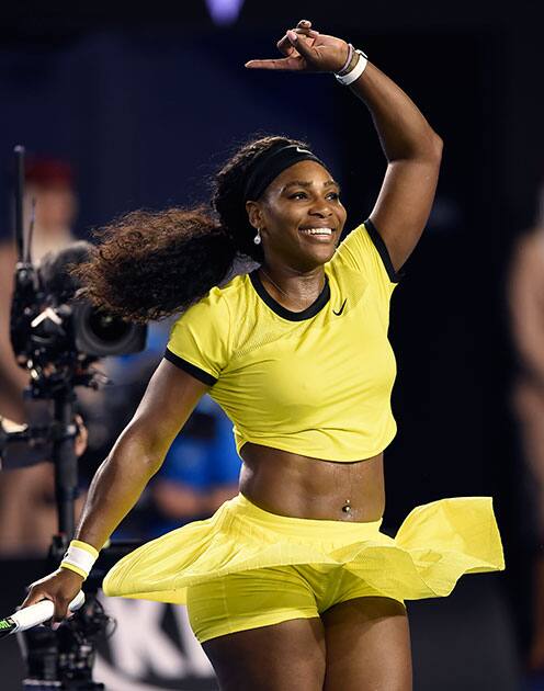 Serena Williams of the United States celebrates after defeating Agnieszka Radwanska of Poland in their semifinal match at the Australian Open tennis championships in Melbourne, Australia.
