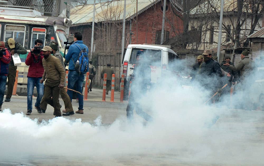 Police lobs tear gas shells during the Million March Protest Rally by Teachers Forum over variaous demands including regularisation of daily wagers at Regal Chowk in Srinagar.