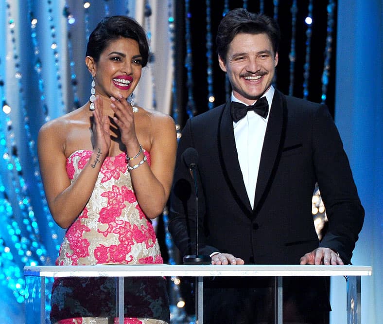 Priyanka Chopra, left, and Pedro Pascal presents the award for outstanding male actor in a drama series at the 22nd annual Screen Actors Guild Awards at the Shrine Auditorium & Expo Hall  in Los Angeles.