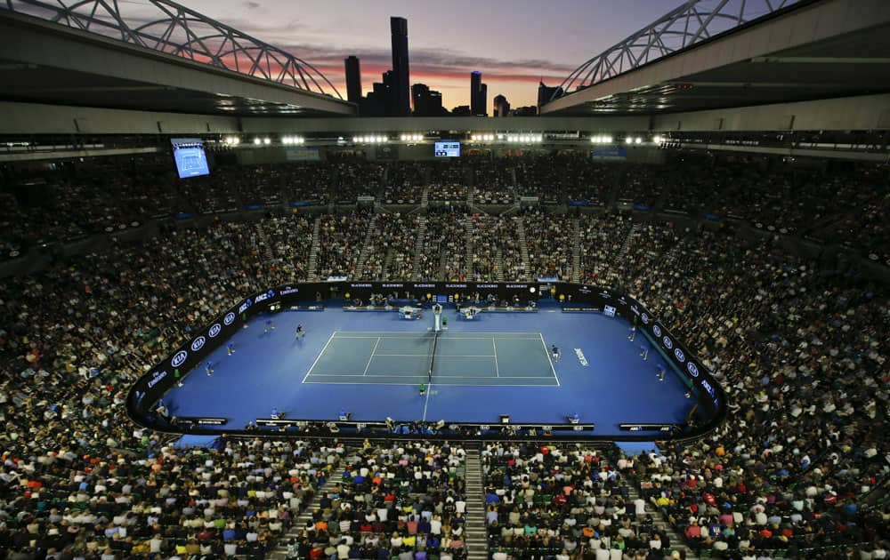 The sun sets over Rod Laver Arena during the men's singles final between Novak Djokovic of Serbia and Andy Murray of Britain at the Australian Open tennis championships in Melbourne.