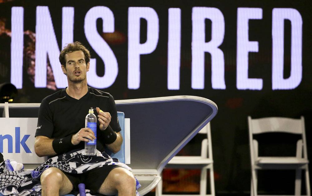 Andy Murray of Britain takes a drink during his men's singles final match against Novak Djokovic of Serbia at the Australian Open tennis championships in Melbourne.