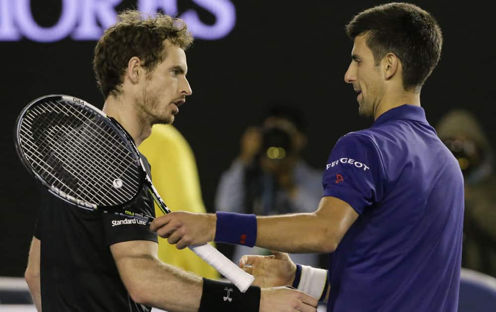 Novak Djokovic, right, of Serbia is congratulated by Andy Murray of Britain after winning the men's singles final at the Australian Open tennis championships in Melbourne.