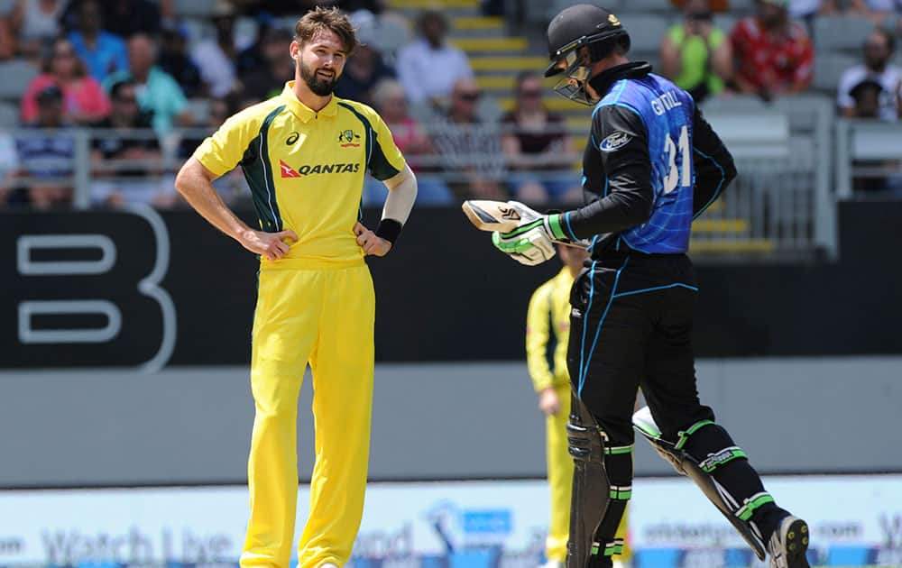 Australia’s Kane Richardson, right, reacts after being hit for 6 by New Zealand’s Martin Guptill in in the first one-day international cricket match at Eden Park in Auckland, New Zealand.