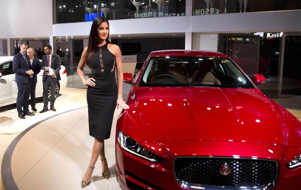 Bollywood actress Katrina Kaif poses next to the newly launched 