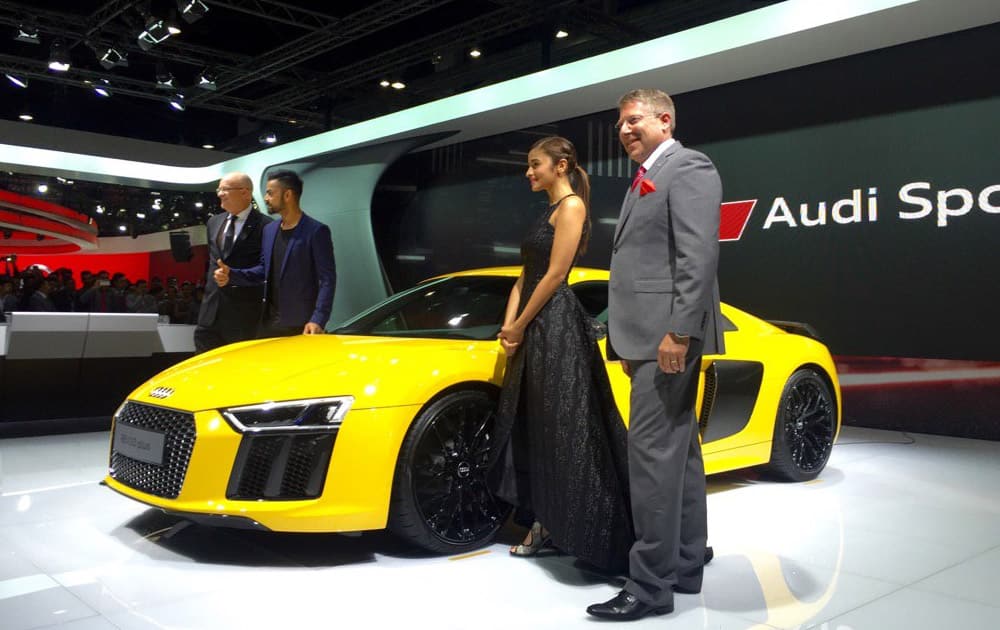 Bollywood actress Alia Bhatt and Indian cricketer Virat Kohli at the launch of the Audi R1 (Pic courtesy: @AudiIN)