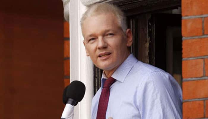 Julian Assange says will accept arrest if UN panel rules against him
