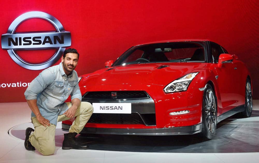 Newly-appointed brand ambassador of Nissan India, actor John Abraham at the companys gallery at Auto Expo 2016 in Greater Noida on Thursday. 