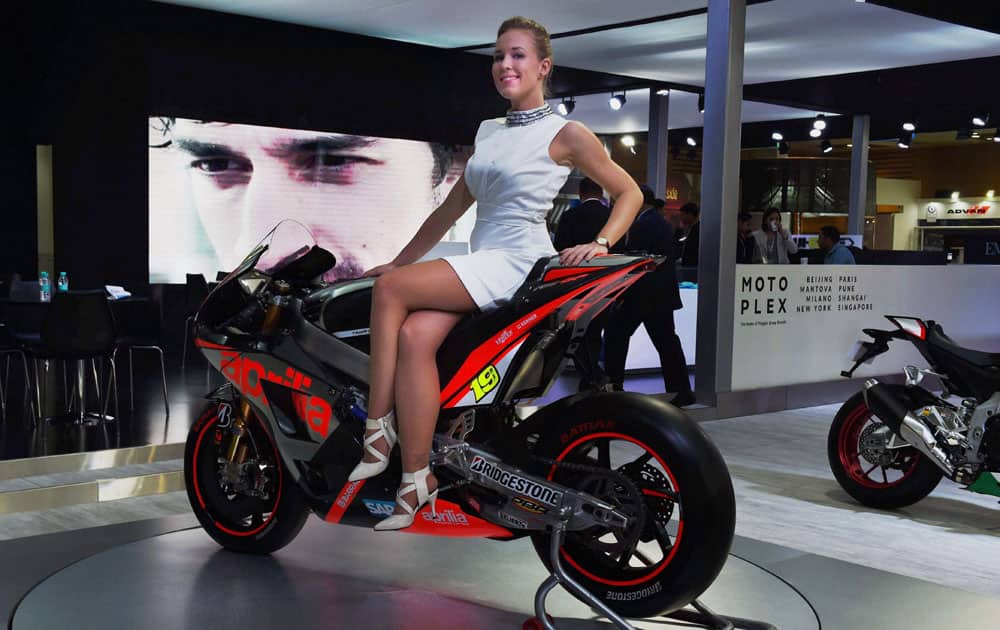 A model poses at the 2016 Auto Expo in Greater Noida.