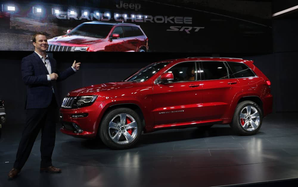Jim Morrison, Director of Jeep Brand Product Marketing unveils the Grand Cherokee SRT at the Auto Expo in Greater Noida, near New Delhi.