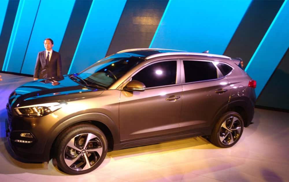 Korean auto major Hyundai unveils sports utility vehicle 'Tucson' at the Auto Expo in Greater Noida, near New Delhi.