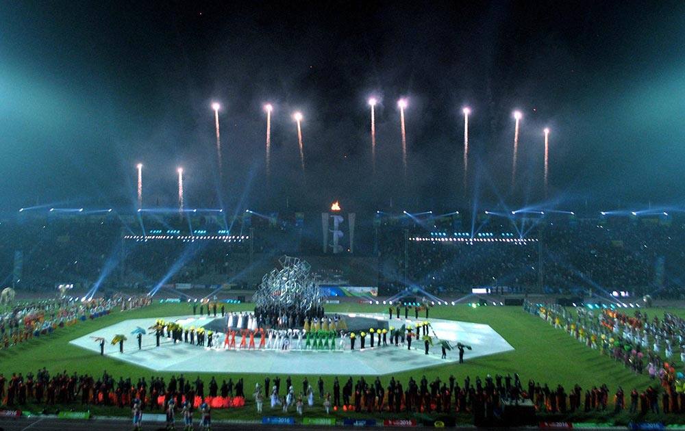 Artists perform at the opening ceremony of 12th South Asian Games at Indira Gandhi Athletics Stadium in Guwahati.