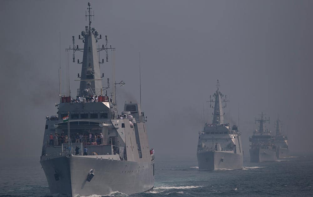 Indian naval ships are seen during the final rehearsal of the International Fleet review in Vishakapatnam.