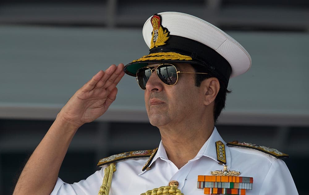 Indian Chief of Naval Staff Robin K. Dhowan salutes sailors during the final rehearsal of the International Fleet review in Vishakapatnam.