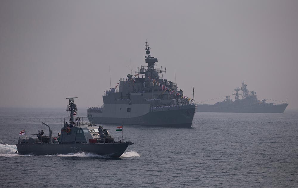 Warships are seen during the final rehearsal of International Fleet review in Vishakapatnam.