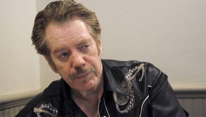 Singer-songwriter Dan Hicks dies at 74