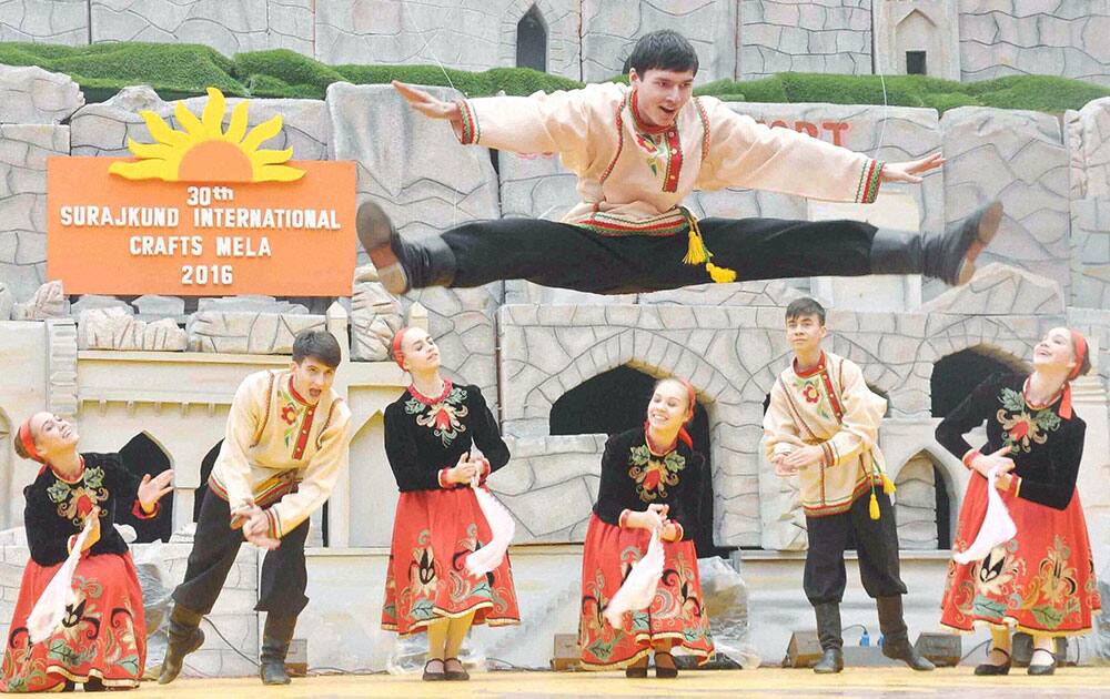 Russian artists perform during Surajkund International Crafts Mela in Faridabad.