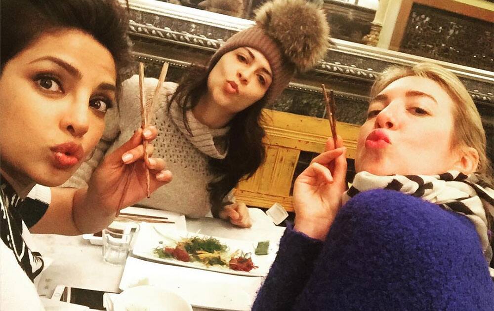 PRIYANKA chopra :- An Indian an Arab an American celebrating Chinese New Year eating Japanese food! #WomenOfTheWorld -instagram